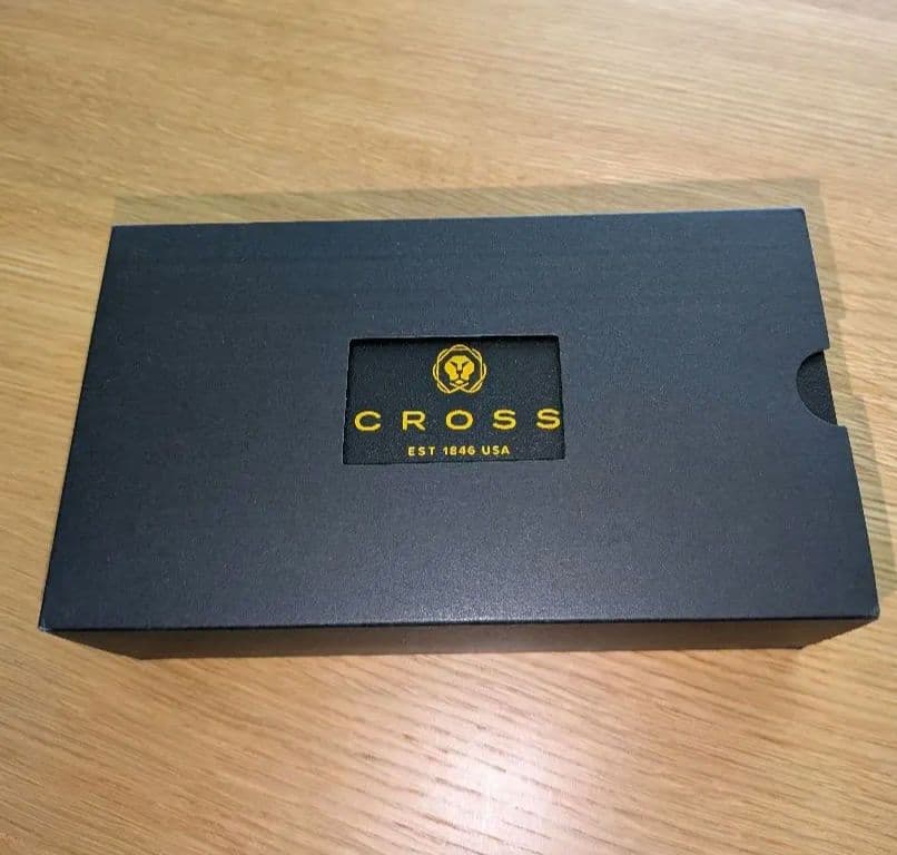 Cross Ballpoint Pen Century II with black lacquer body, gold clip, and twist mechanism