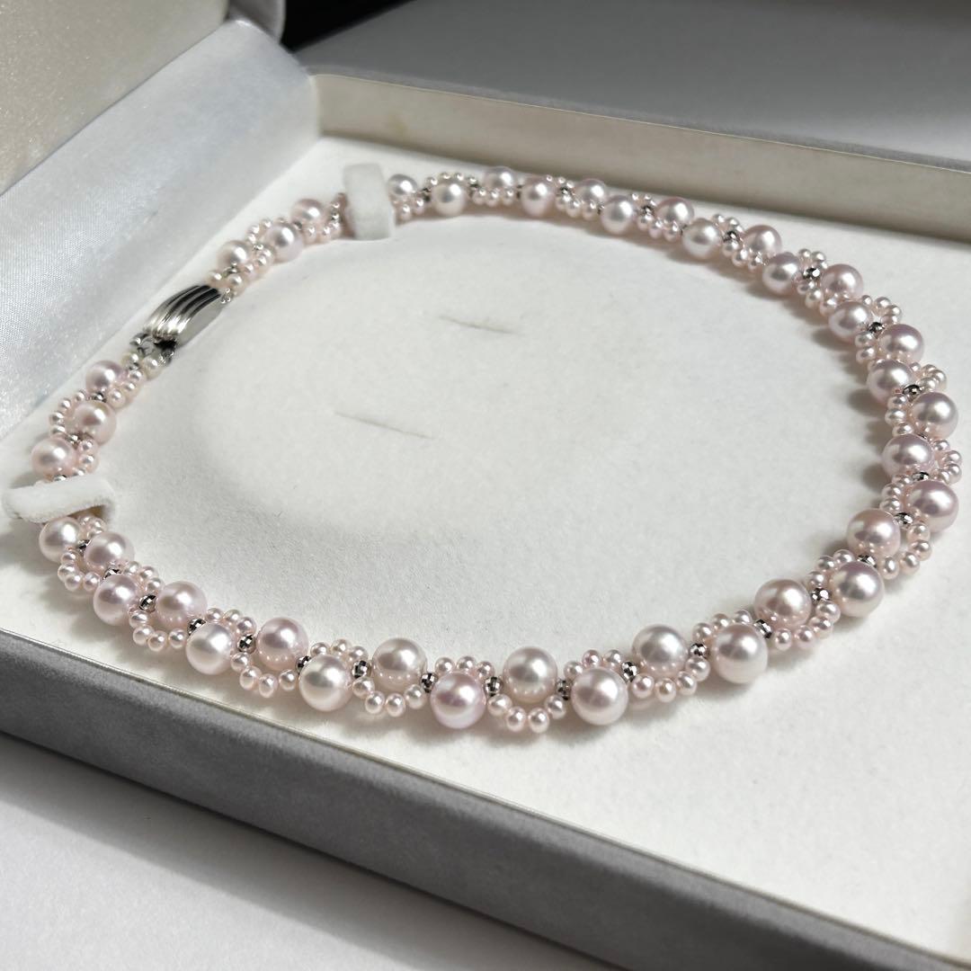 Rare design pink cultured pearl necklace with pearls sized 3.5-8.5 mm and 43 cm length