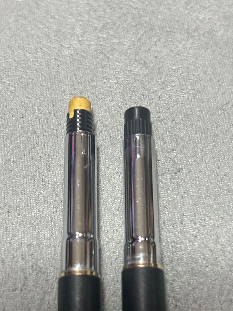 Cross Century Classic black lacquer ballpoint pen and mechanical pencil set with slim black and gold bodies