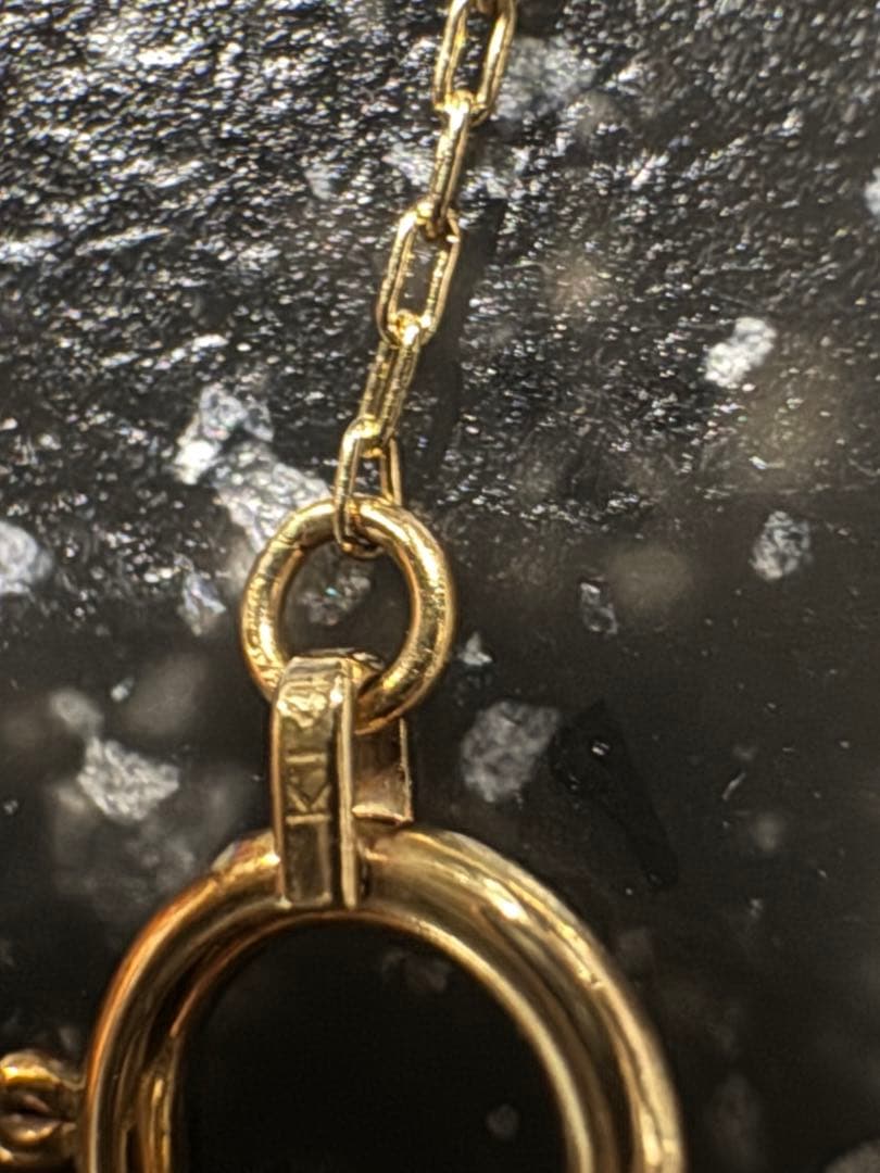 Perlagione Akoya baby pearl necklace in 14K gold with 42 cm length displayed on a jewelry stand