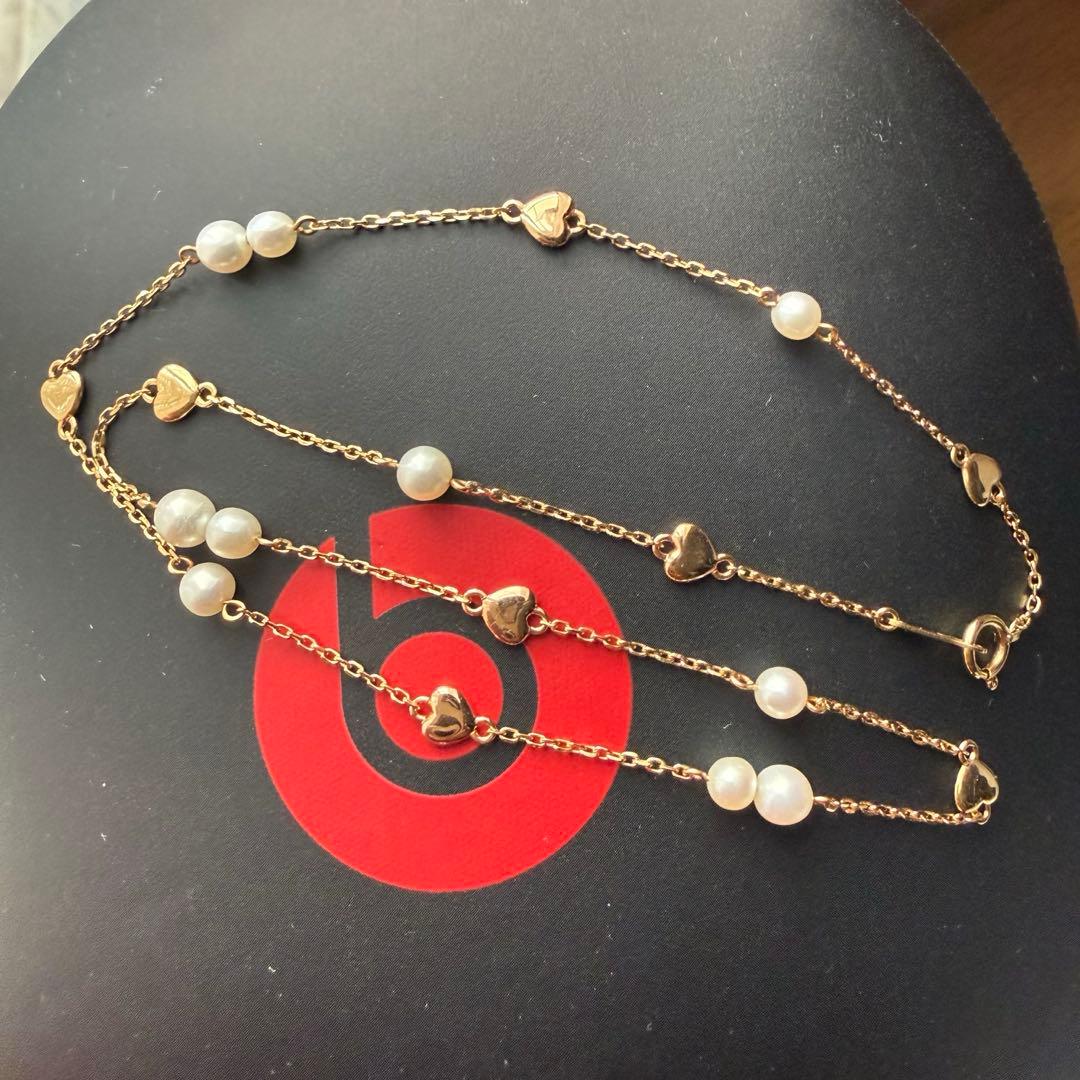 K18YG Heart Motif Pearl Necklace made of 18K gold with a heart design and a single pearl pendant