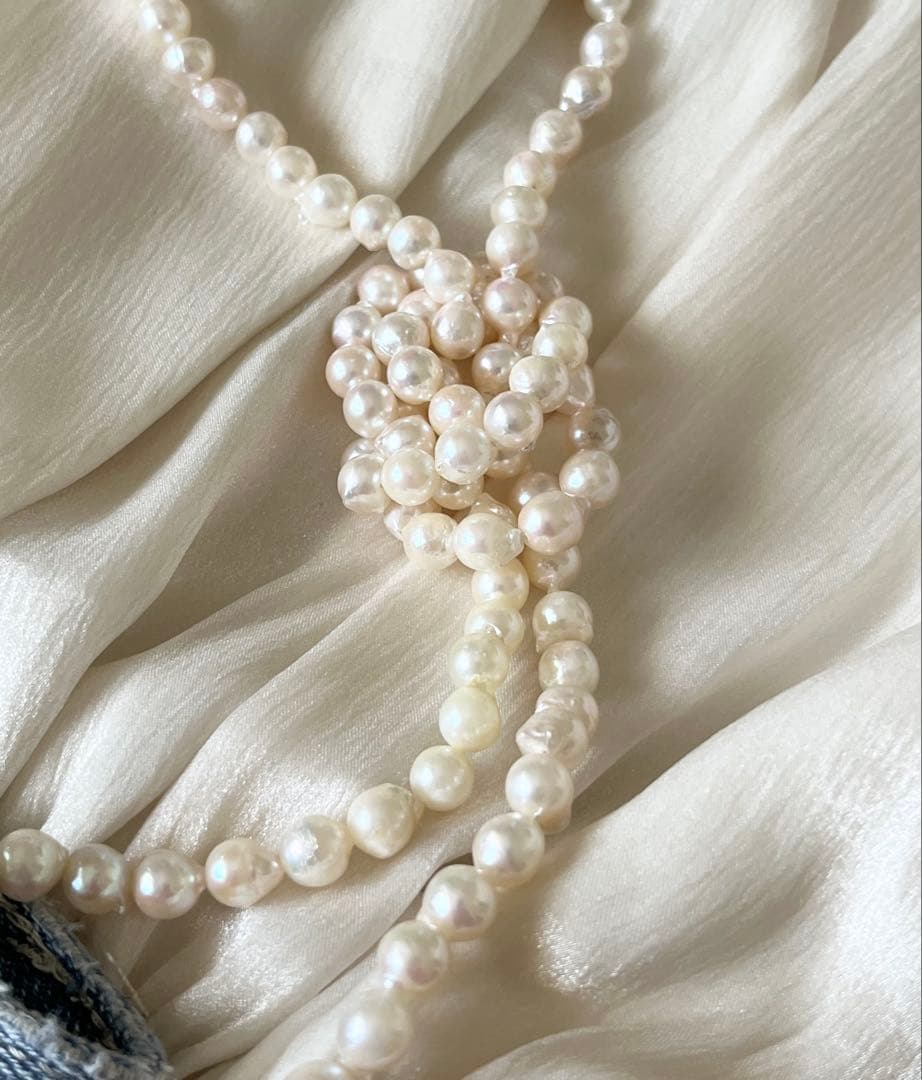 Akoya pearl ultra long necklace with 6.5-7mm off white pearls measuring 162cm in length featuring 2-3 strands