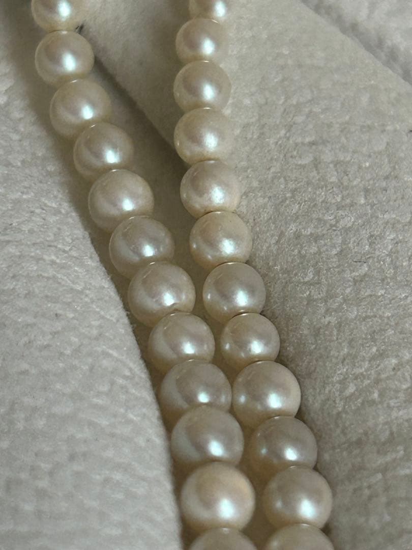 Akoya pearl gradient double necklace with silver clasp featuring white pearls ranging from 3 to 8 mm