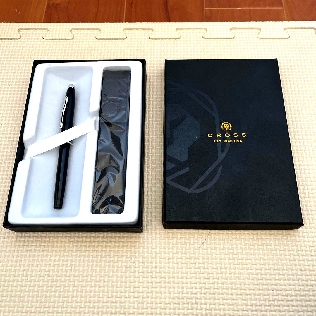 Cross Ballpoint Pen with sleek silver body and black grip shown on white background