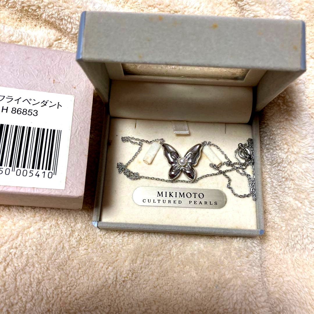 Mikimoto JAL Butterfly Pendant with tarnished silver chain and visible case wear