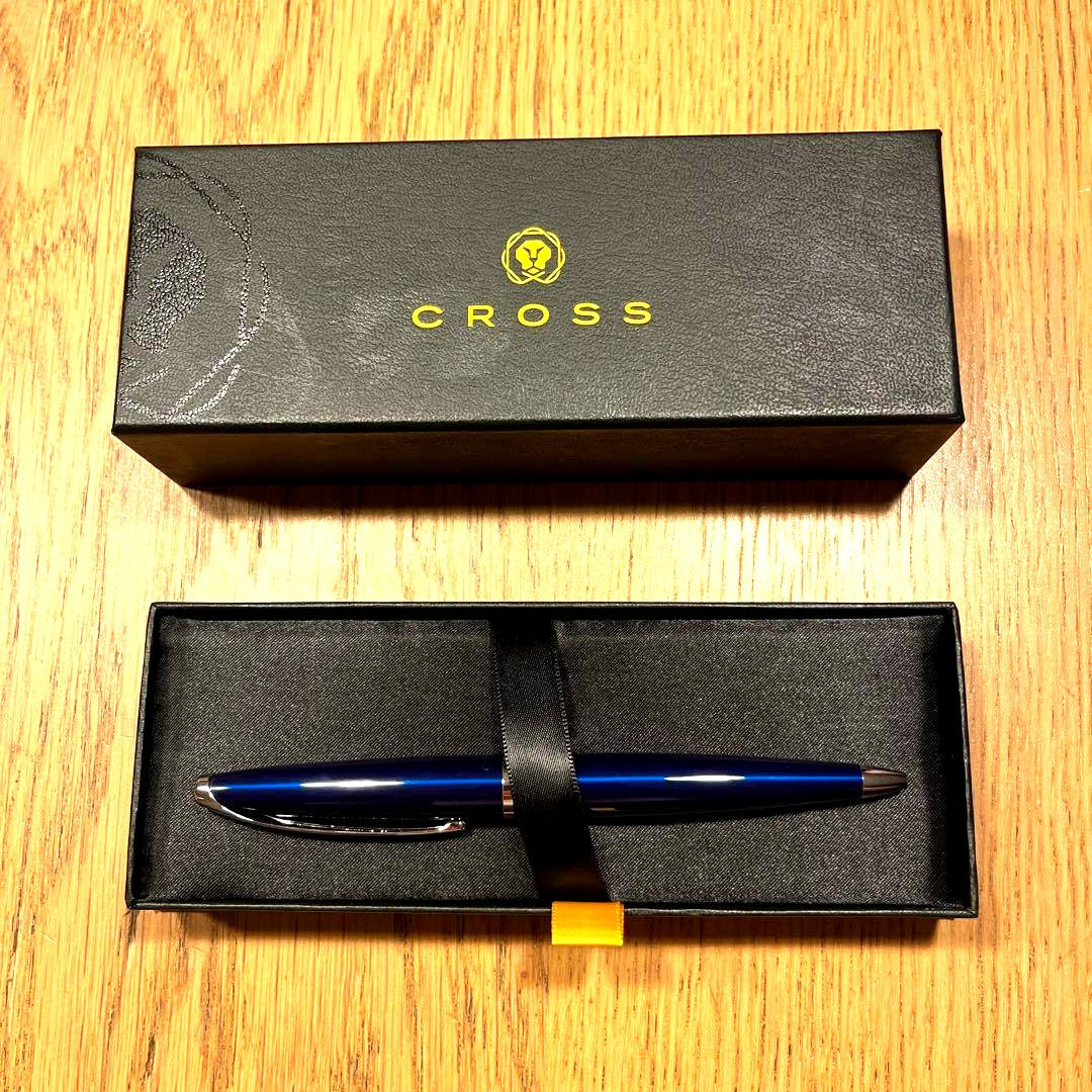 CROSS Blue ballpoint pen with sleek metallic finish and blue ink tip