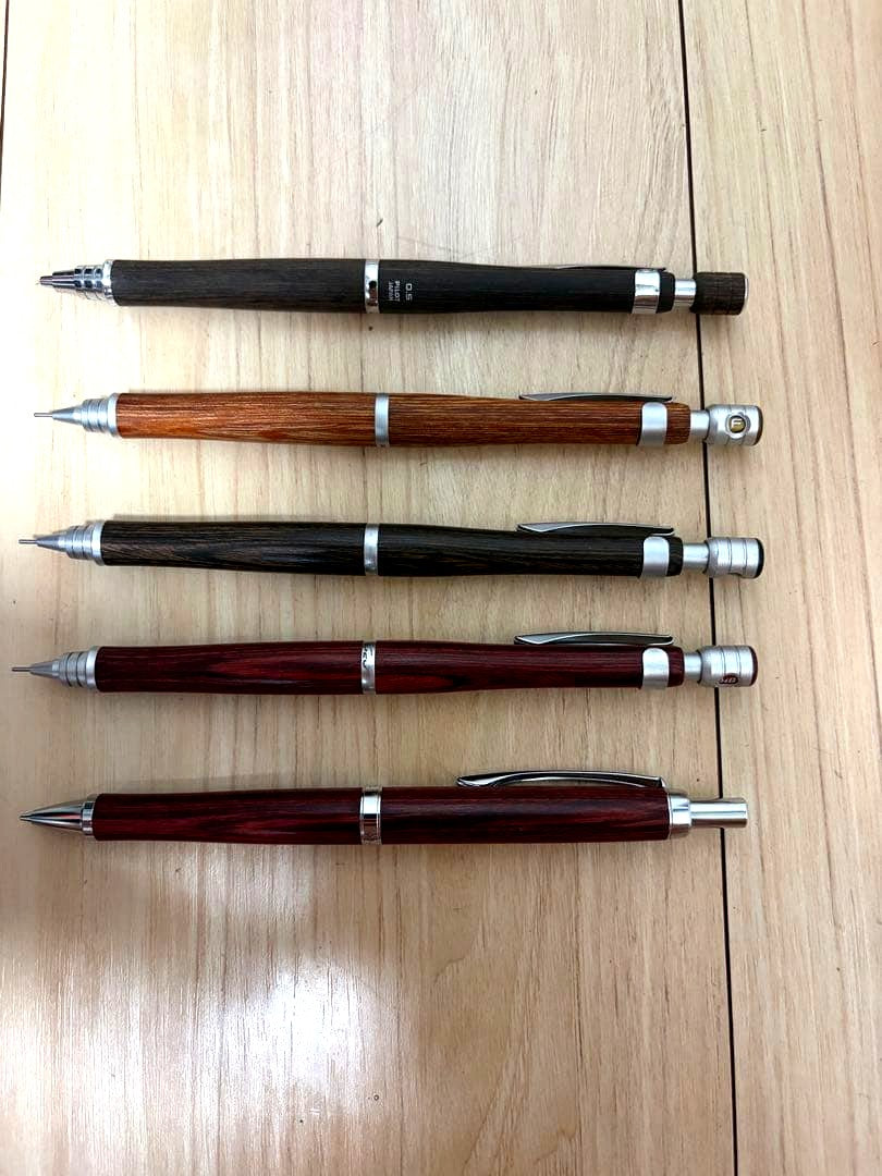 Five PILOT S20 S30 mechanical pencils made of resin-impregnated wood displayed together