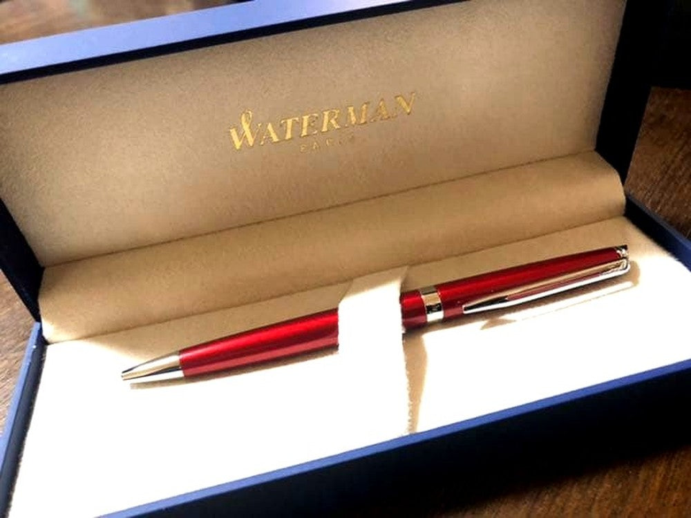Waterman New ballpoint pen with sleek black barrel and silver accents displayed with box