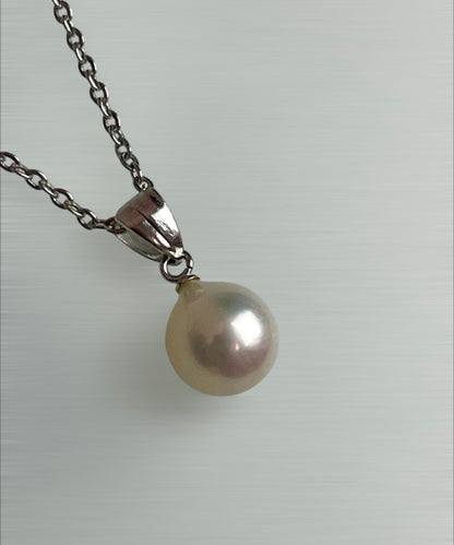 Akoya pearl necklace with a single 8.5mm white pearl on a silver chain