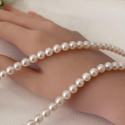 356 Mikimoto K14 Pearl Necklace with 6.5-6.9mm pearls and 56cm length
