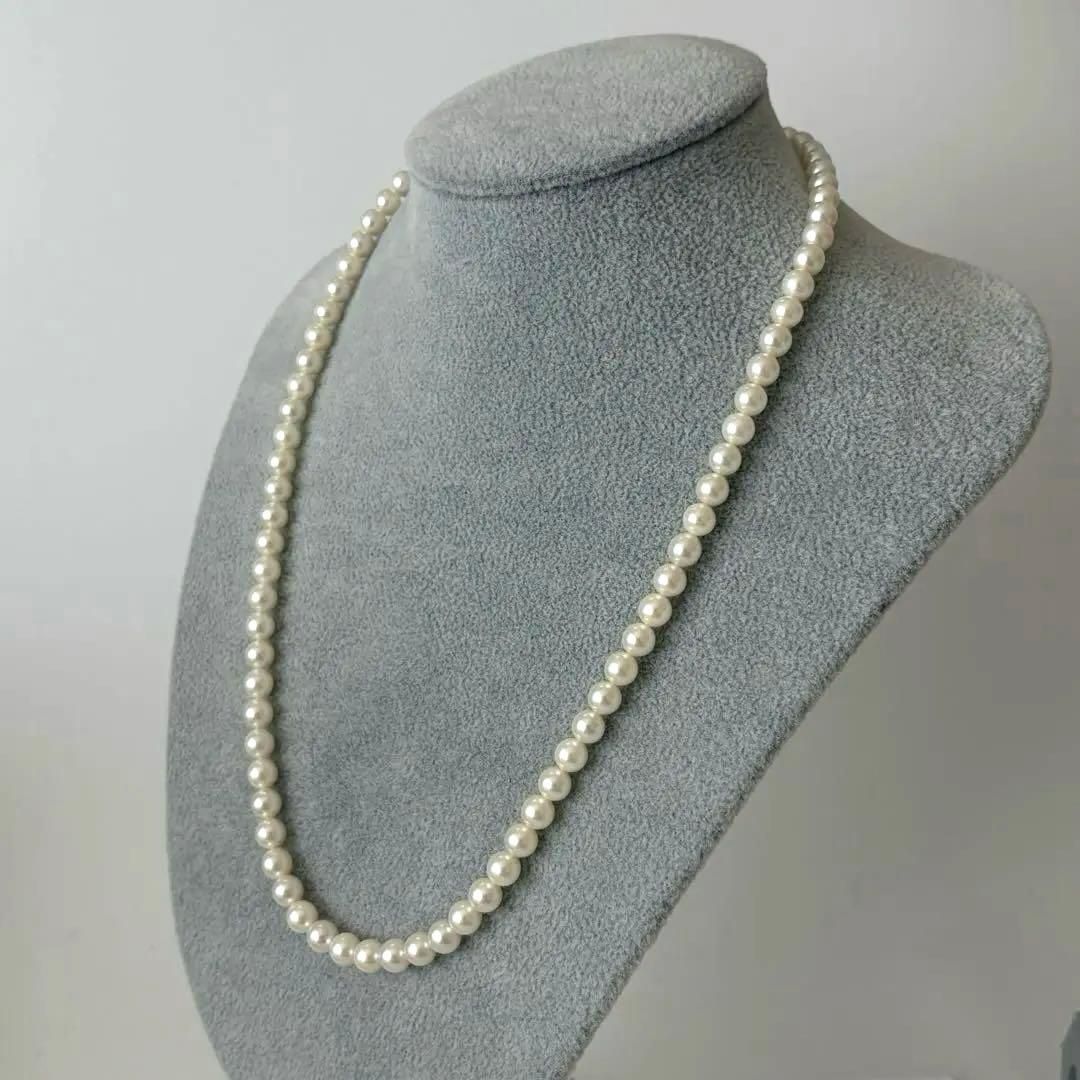 356 Mikimoto K14 Pearl Necklace with 6.5-6.9mm pearls and 56cm length