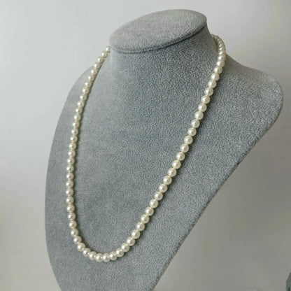 356 Mikimoto K14 Pearl Necklace with 6.5-6.9mm pearls and 56cm length