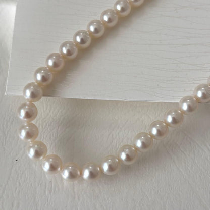 356 Mikimoto K14 Pearl Necklace with 6.5-6.9mm pearls and 56cm length