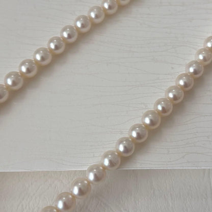 356 Mikimoto K14 Pearl Necklace with 6.5-6.9mm pearls and 56cm length