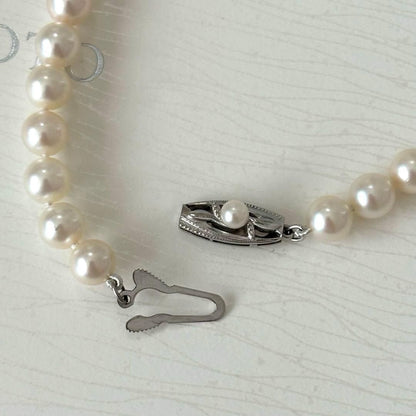 356 Mikimoto K14 Pearl Necklace with 6.5-6.9mm pearls and 56cm length