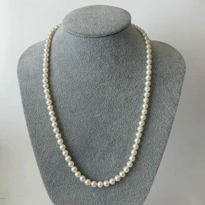 356 Mikimoto K14 Pearl Necklace with 6.5-6.9mm pearls and 56cm length