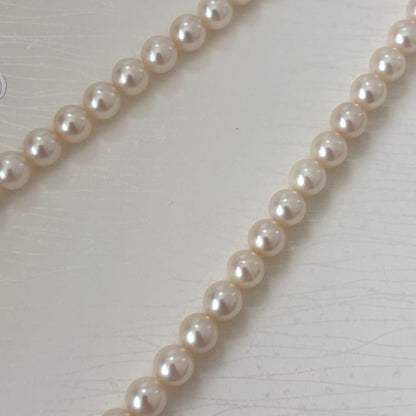 356 Mikimoto K14 Pearl Necklace with 6.5-6.9mm pearls and 56cm length