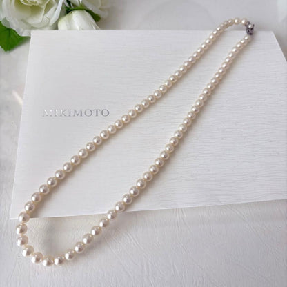 356 Mikimoto K14 Pearl Necklace with 6.5-6.9mm pearls and 56cm length