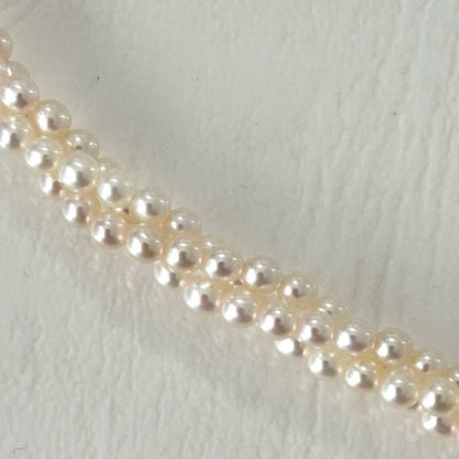 428 Tasaki silver necklace with three rows of approximately 2.7-2.9mm pearls and silver clasp