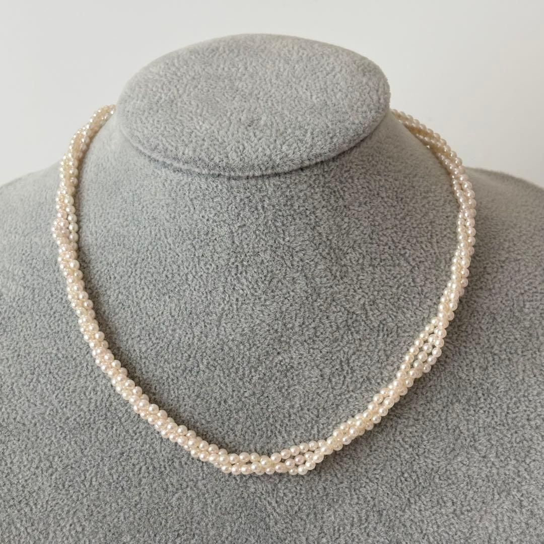 428 Tasaki silver necklace with three rows of approximately 2.7-2.9mm pearls and silver clasp