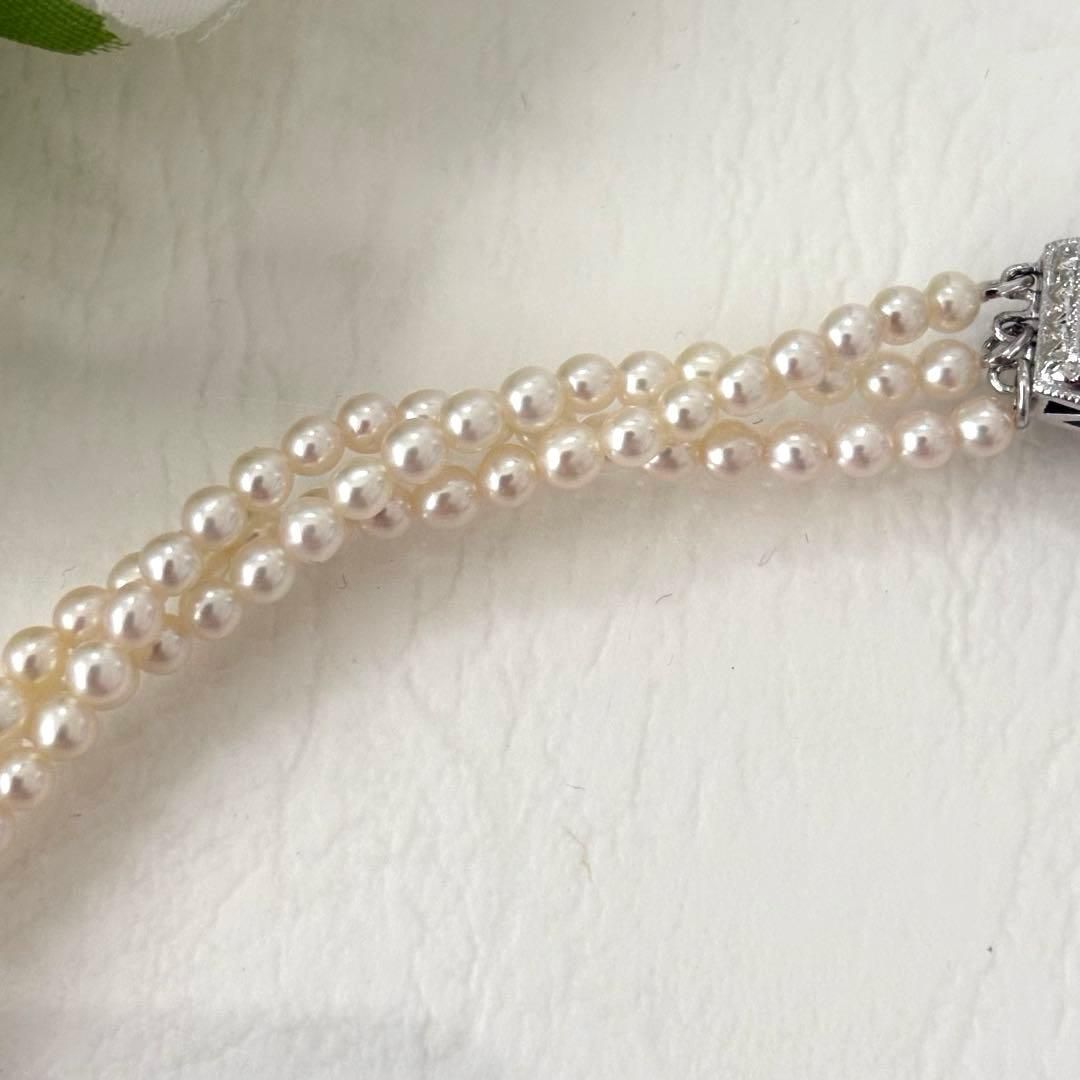 428 Tasaki silver necklace with three rows of approximately 2.7-2.9mm pearls and silver clasp