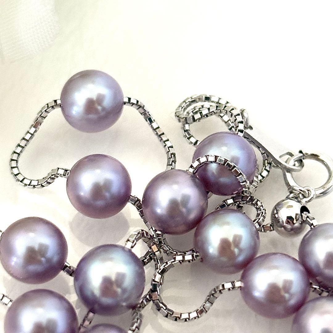 186Tasaki K18 station necklace with purple pearls, 44cm adjustable chain on white background