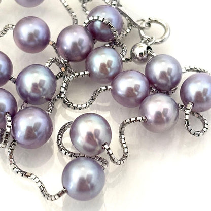 186Tasaki K18 station necklace with purple pearls, 44cm adjustable chain on white background