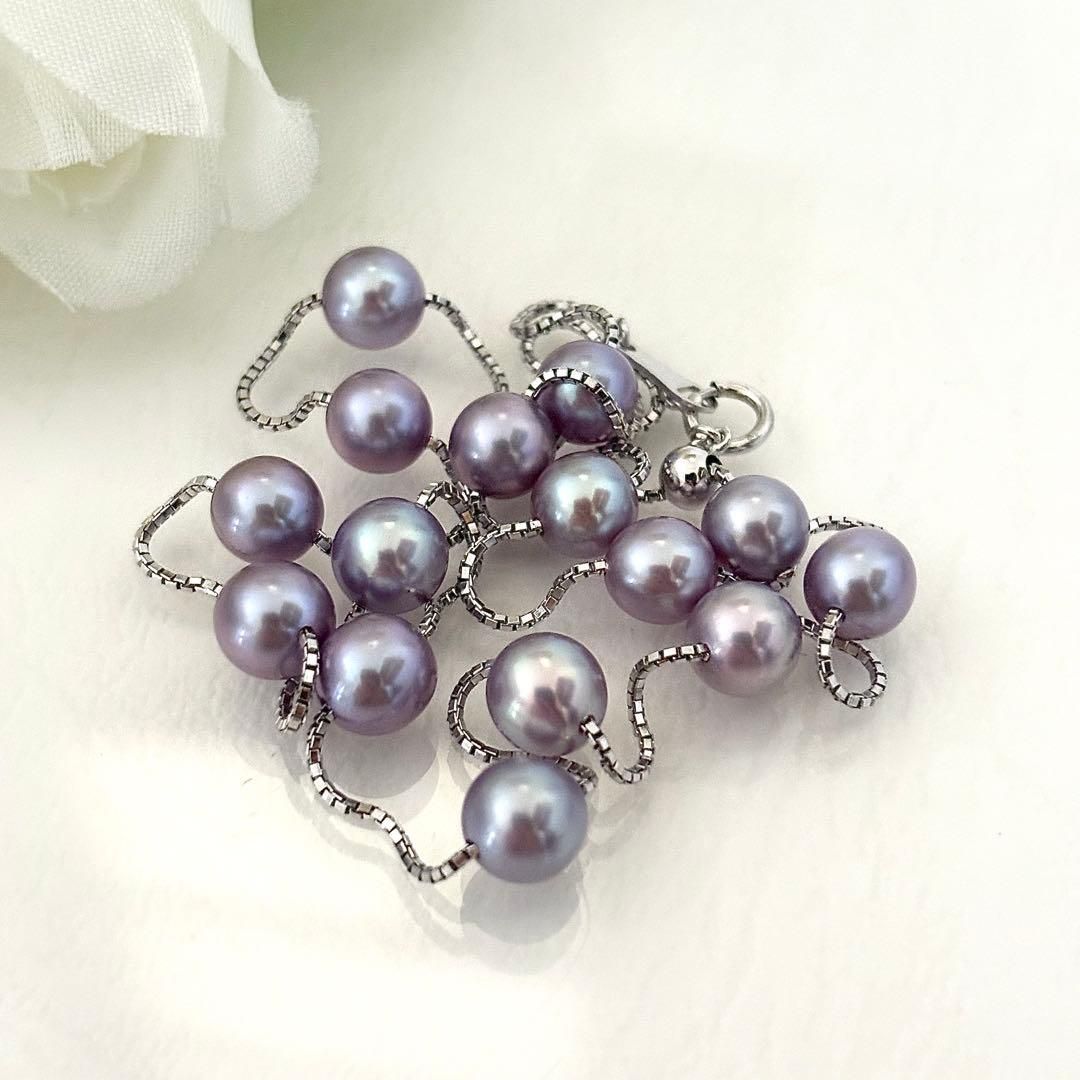 186Tasaki K18 station necklace with purple pearls, 44cm adjustable chain on white background