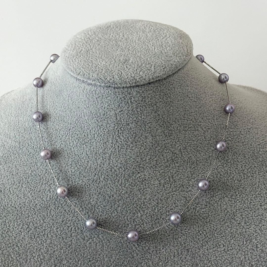 186Tasaki K18 station necklace with purple pearls, 44cm adjustable chain on white background