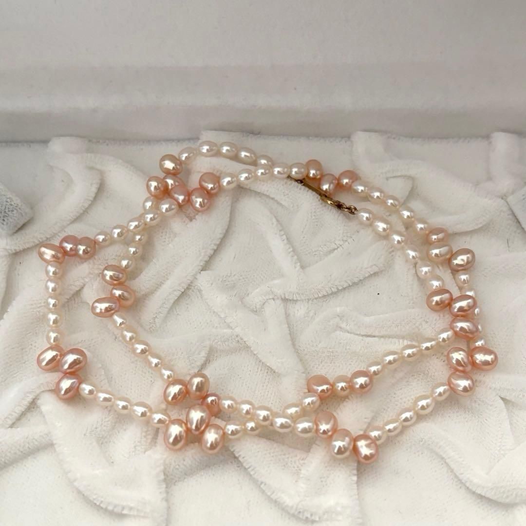 Close-up of 393 Tasaki K18 gold necklace with pearls measuring 47.5 cm length