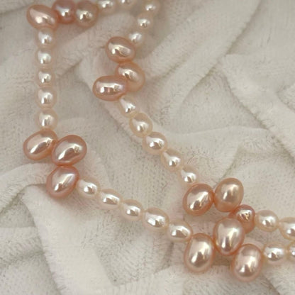 Close-up of 393 Tasaki K18 gold necklace with pearls measuring 47.5 cm length