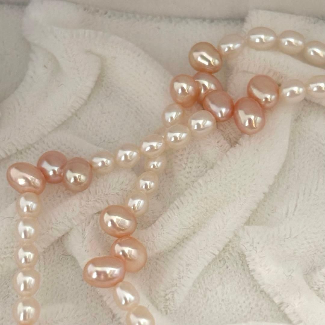 Close-up of 393 Tasaki K18 gold necklace with pearls measuring 47.5 cm length