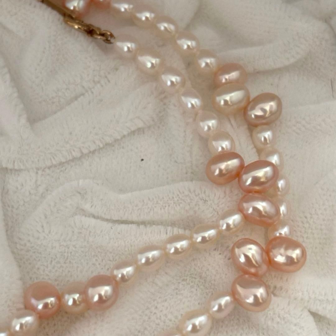 Close-up of 393 Tasaki K18 gold necklace with pearls measuring 47.5 cm length