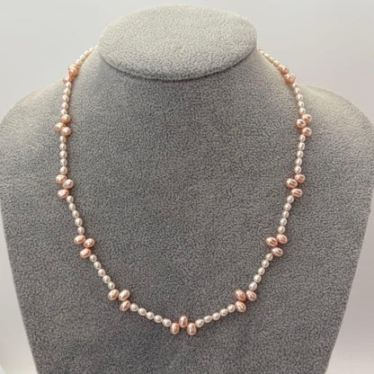 Close-up of 393 Tasaki K18 gold necklace with pearls measuring 47.5 cm length