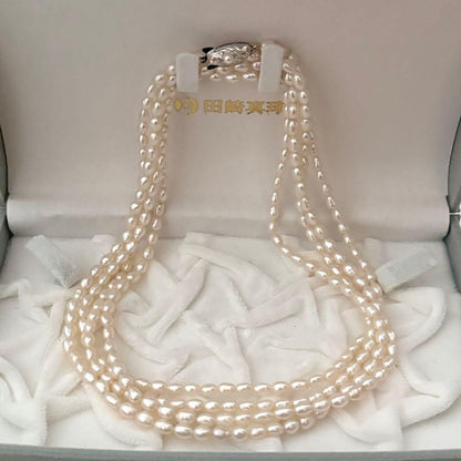 219 Tasaki long necklace made of silver with pearls, approximately 163 cm in length