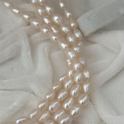 219 Tasaki long necklace made of silver with pearls, approximately 163 cm in length