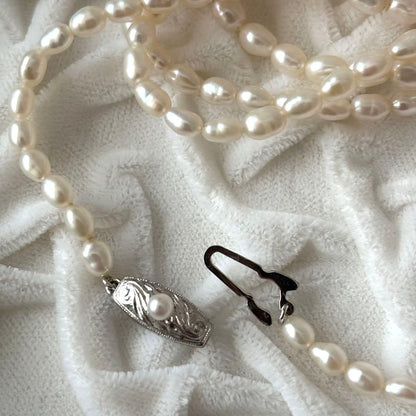 219 Tasaki long necklace made of silver with pearls, approximately 163 cm in length
