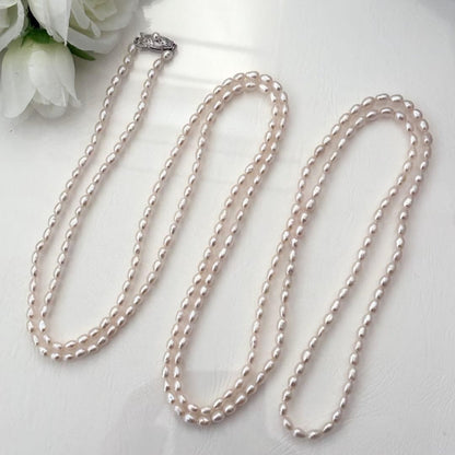 219 Tasaki long necklace made of silver with pearls, approximately 163 cm in length