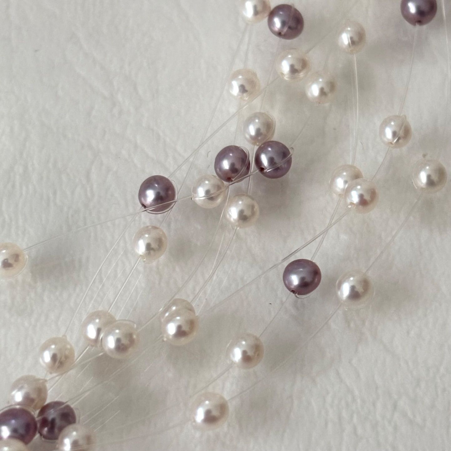 250Tasaki K18 8-row pearl necklace with white and purple pearls, 43 cm long