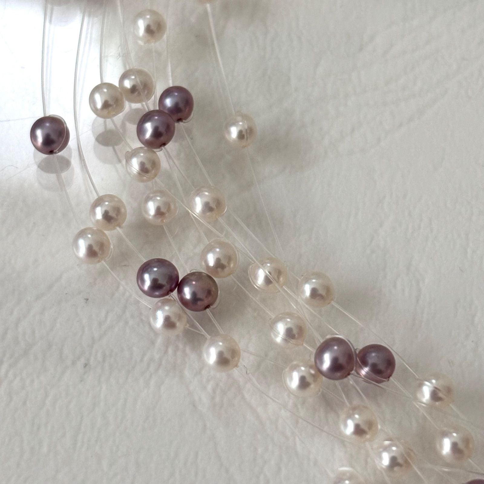 250Tasaki K18 8-row pearl necklace with white and purple pearls, 43 cm long