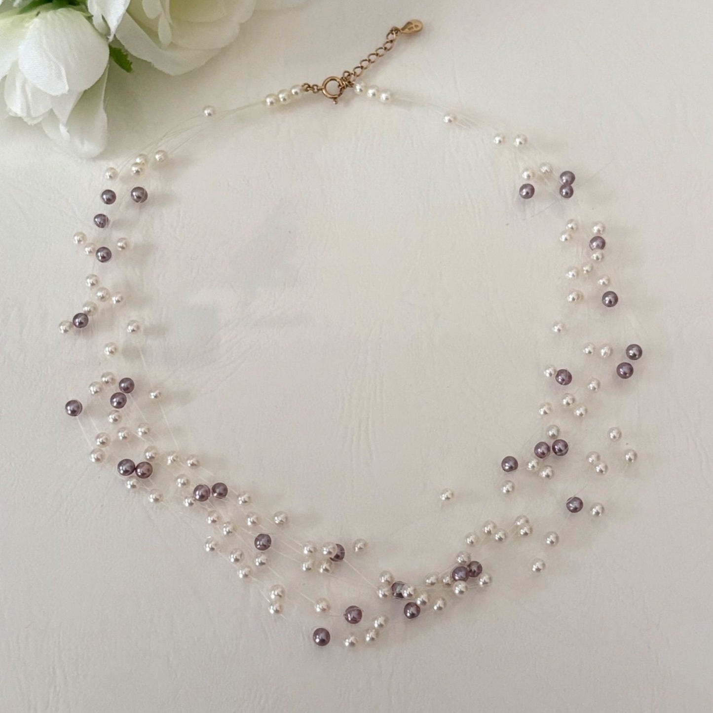 250Tasaki K18 8-row pearl necklace with white and purple pearls, 43 cm long