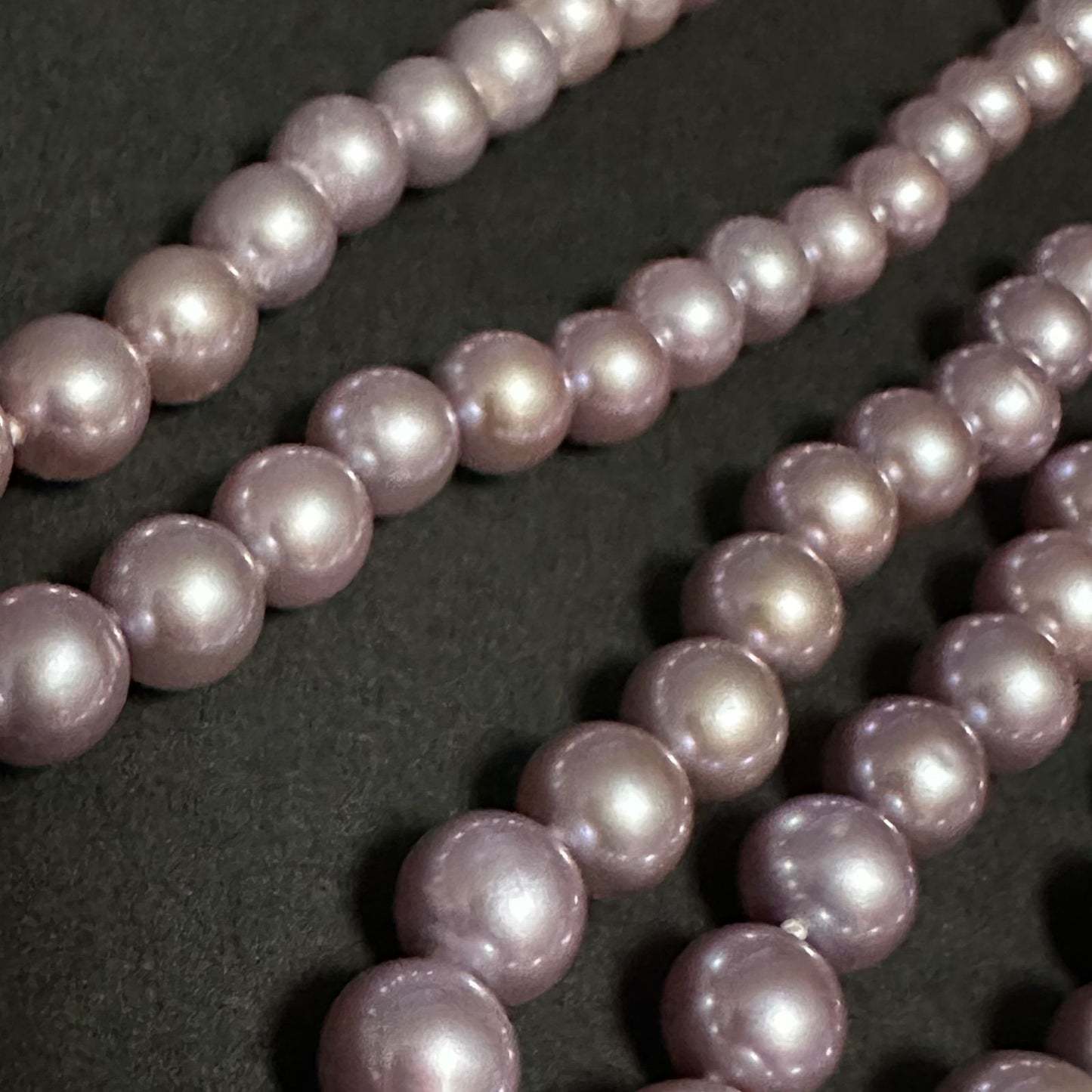 Tasaki purple pearl necklace with silver chain featuring 7.0-8.1mm pearls measuring 95cm in length