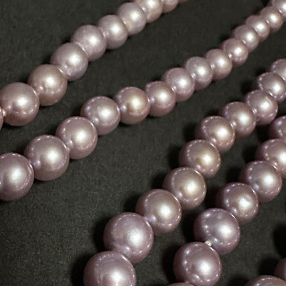 Tasaki purple pearl necklace with silver chain featuring 7.0-8.1mm pearls measuring 95cm in length