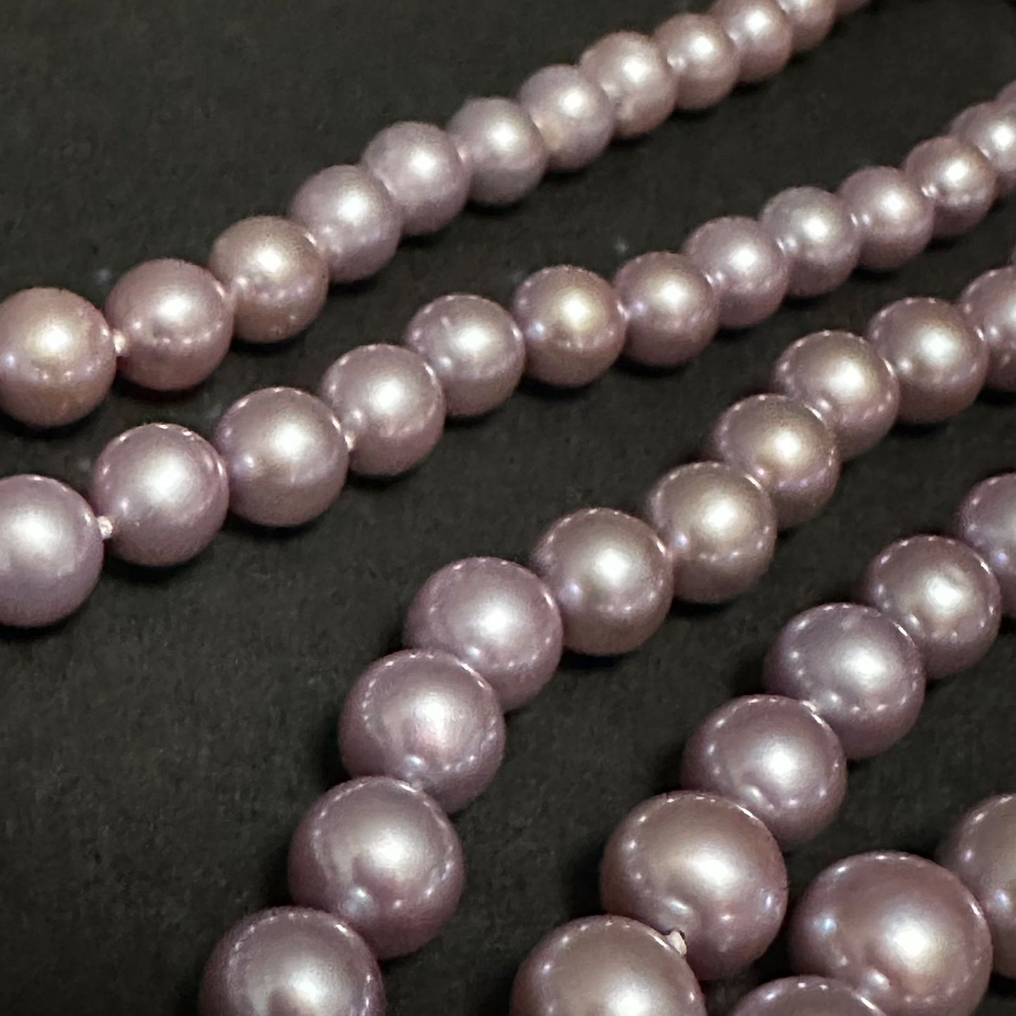Tasaki purple pearl necklace with silver chain featuring 7.0-8.1mm pearls measuring 95cm in length