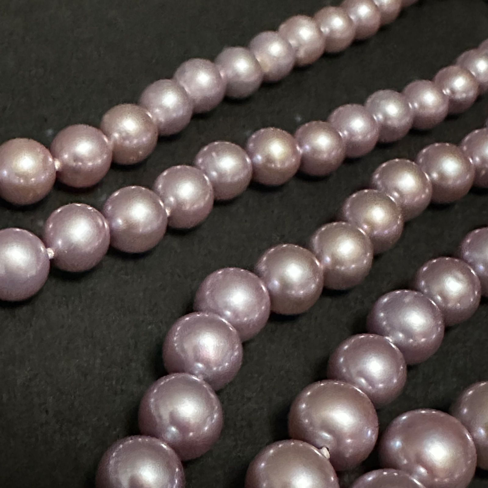 Tasaki purple pearl necklace with silver chain featuring 7.0-8.1mm pearls measuring 95cm in length