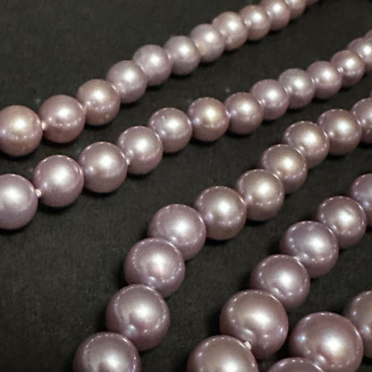 Tasaki purple pearl necklace with silver chain featuring 7.0-8.1mm pearls measuring 95cm in length