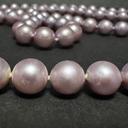 Tasaki purple pearl necklace with silver chain featuring 7.0-8.1mm pearls measuring 95cm in length