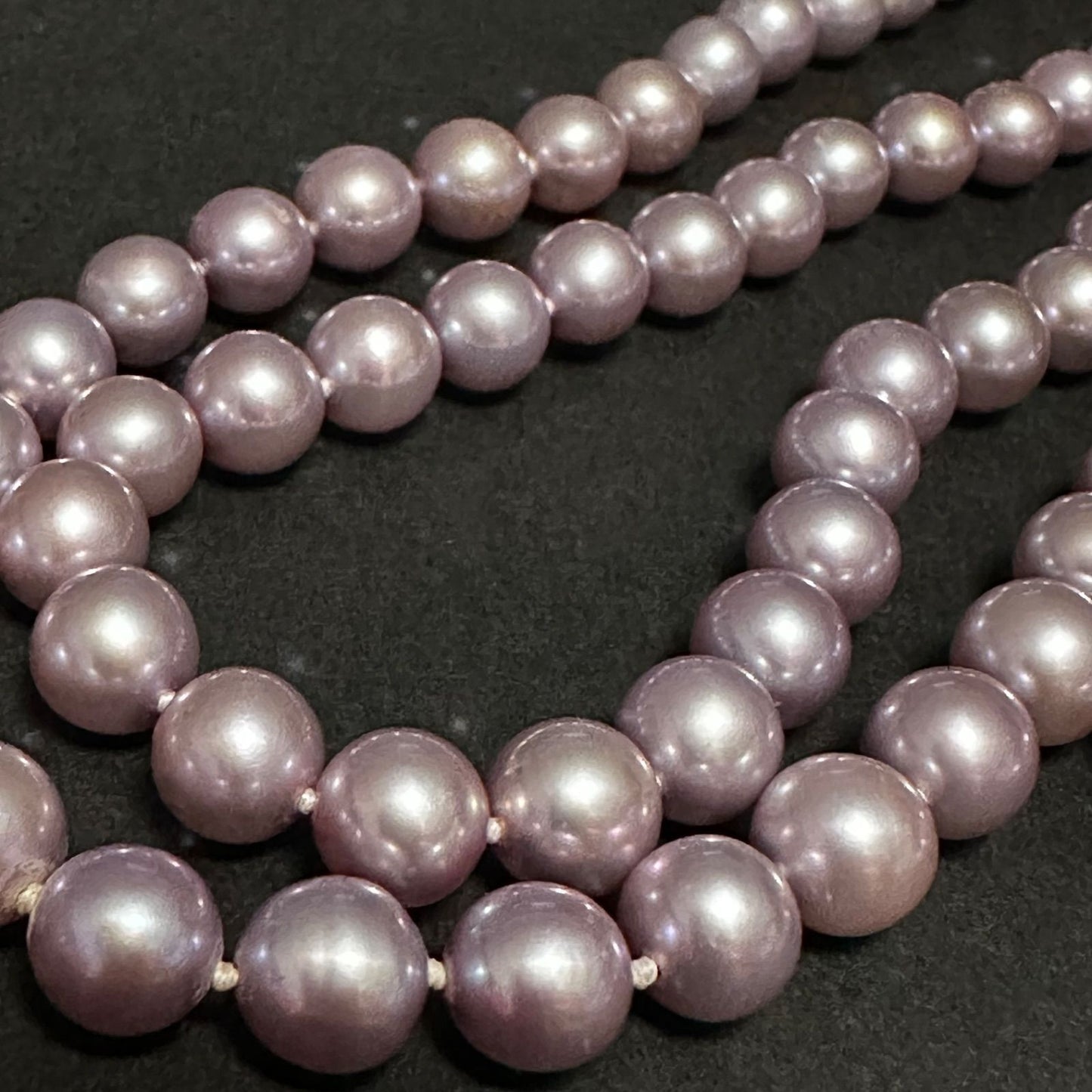 Tasaki purple pearl necklace with silver chain featuring 7.0-8.1mm pearls measuring 95cm in length
