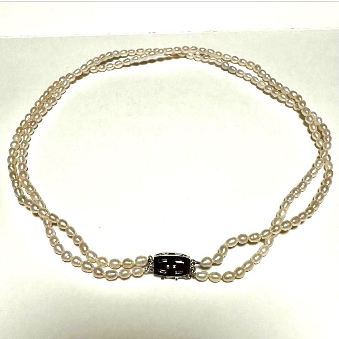Tasaki Law two-strand white freshwater pearl necklace with silver clasp, 42.5 cm length