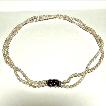 Tasaki Law two-strand white freshwater pearl necklace with silver clasp, 42.5 cm length